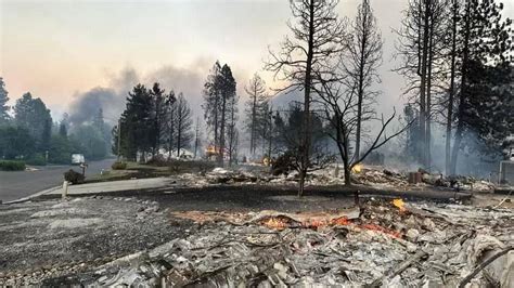 Thousands under evacuation orders and some homes burn as wildfires race through Washington state