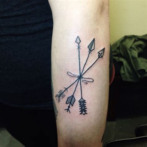 Three arrows to represent the Holy Trinity. Each different and