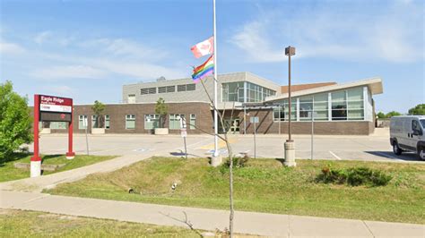 Three facing charges after racist posters found outside Ajax school