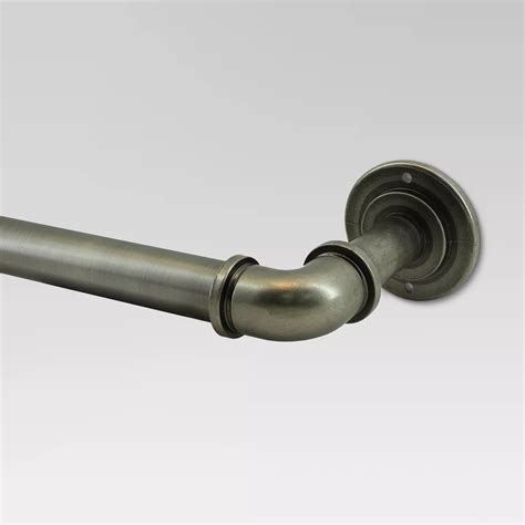 In a brass finish, this powder-coated steel curtain rod will fit in seamlessly with any decor aesthetic, and it's adjustable in length to accommodate your window width. It's adorned with clear ribbed finials on each end for a stylish look. In a brass finish, this powder-coated steel curtain rod will fit in seamlessly with any decor aesthetic ...