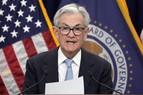 Ticker: Fed hikes key rate, hints pause ahead; CVS beats Q1 expectations, cuts outlook 