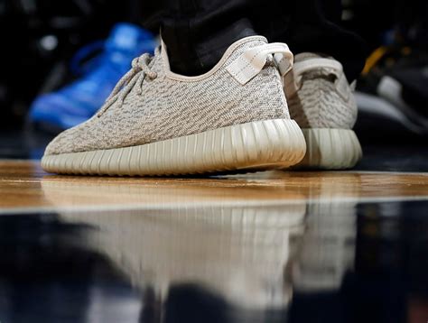 Ticker: Adidas to start selling stockpile of Yeezy sneakers