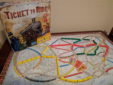 Ticket for a ride game. Answer: Alan R. Moon. "Ticket to Ride" is a railroad themed board game for 2-5 players. The game was designed by Alan R. Moon, who was born in Southampton, England in 1951. "Ticket to Ride" was first published in 2004 and has won several awards including the prestigious Spiel des Jahres, which is awarded in Germany. 