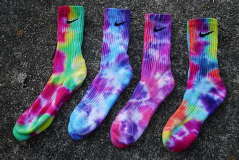 Tie dye socks. Tie-Dye Socks. Step 1: Make sure socks are 100% cotton. Step 2: Bind socks with rubber bands. Step 3: Dampen and wring out excess water. Step 4: Add different dye ... 