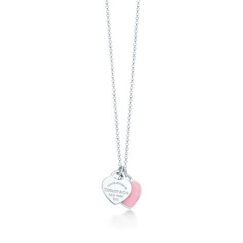 Tiffany and co pink double heart necklace. Necklaces and Pendants. The long and the short of it is, Tiffany & Co. necklaces are the only finishing touch you need. Keep your style simple with striking essentials you’ll wear every day, like a diamond pendant or simple chain necklace that goes with everything. Add a long necklace or colorful gemstones the next time you want simple drama ... 