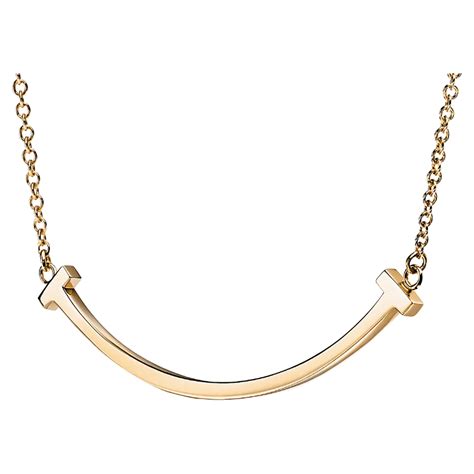 Explore Tiffany necklaces and styling inspiration. Whether getting dressed up for the day or for a night out, let us inspire your layered look. BannerItem 1 ... Tiffany T:Smile Pendant in Rose Gold, Small. € 1.250,00. Tiffany T:Diamond and Mother-of-pearl Circle Pendant in 18k Rose Gold, 16-18" € 3.250,00.. Tiffany smile necklace