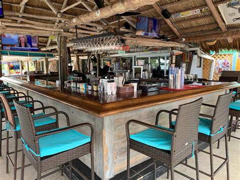 Tiki bar key largo. Snappers Oceanfront Restaurant & Bar is a seafood restaurant and tiki bar located on the oceanfront in Key Largo, FL. The menu features fresh catches of the sea, as well as brunch every Sunday with live jazz music. 