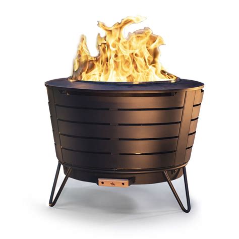 Tiki fire pit. This bundle contains 2 items (may ship separately) Bundle List Price: $545.00. Bundle Price: $458.70. You Save: $86.30. 1 of TIKI Brand Smokeless Patio Fire Pit, Wood Burning Outdoor Fire Pit - Includes Wood Pack, Modern Design with Removable Ash Pan, 24.75 x 24.75 x 18.75 inches, Black. 