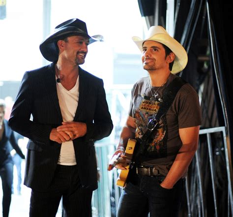 Tim McGraw and Brad Paisley drop new tunes, hope to ride current country music surge on the charts
