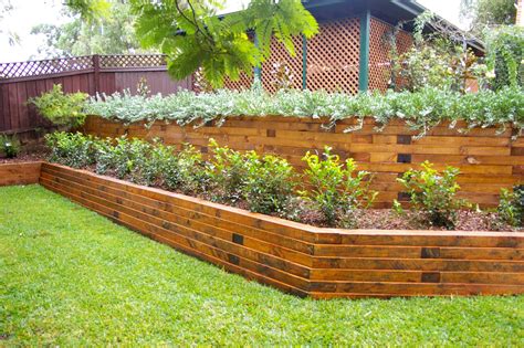 Timber retaining wall. We regularly construct timber retaining walls all over Auckland. See how you too can create more functional land with a well-built retaining wall. 