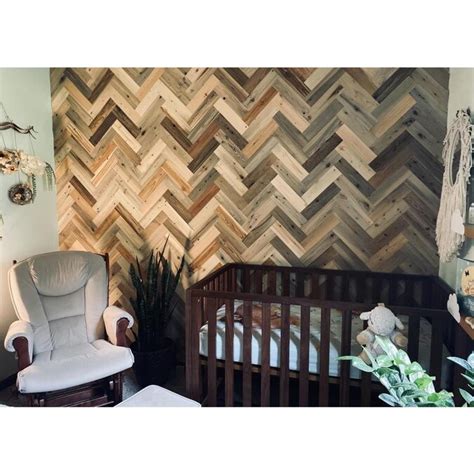 The River Plank with a herringbone accent wall adds a unique and timeless touch to any space. . Timberchic