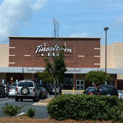 28146. The Tinseltown USA Stadium Cinema 14 opened under Cinemark Cinemas on June 12, 1998. It was the largest megaplex cinema to open in in Salisbury and was Rowan County’s largest theatre. Located in the Innes Street Market Shopping Center, the Tinseltown has all stadium seating with digital Dolby sound and projection.. 