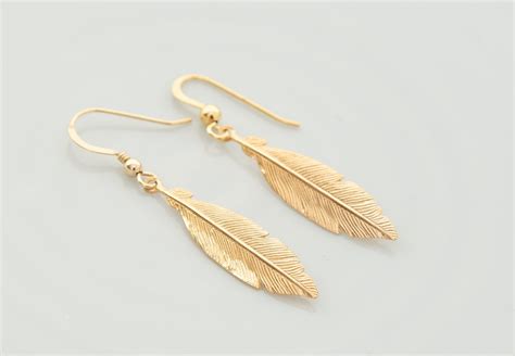 Tiny Gold Feather Earrings hardtofind.