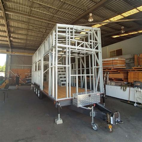 Tiny house frame: Our tiny house trailer receives its steel frame