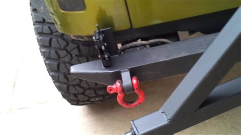 A 2" receiver hitch (with easily accessible pin) and laser-cu
