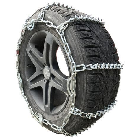 The connectors should be positioned on the outside of the tire, and any tensioning devices should face away from the tire. Drape the chains over the tire: Place them on top of the tire, ensuring they are evenly distributed across the tread. For ladder-style chains, ensure that the cross chains align with the center of the tire’s tread.. 