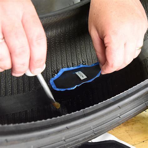Removing the tire from the wheel, inspecting the inside, drilling, buffing, and filling the hole with a repair unit. Sealing the buffed surfaces, mounting, a.... 