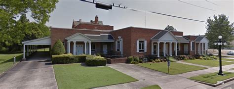 In 1950, William M. Tisdale and his wife, Mary, took over operation of the funeral home. They purchased it in 1959. In 1963, another modern facility was opened in Nettleton, also operating as Lann Memorial Funeral Home. Also in 1963, Lann Memorial in Aberdeen further expanded by acquiring Harrison Funeral Home.. 