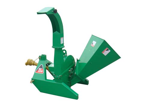The chute swivels 300 degrees and the top deflector adjusts the distance. Self-Feeding Hopper The self-feed hopper is designed to angle the brush against the rotor and blades, pulling the branches into the chipper. Feed hopper fold for easy storage and transport. Min. Operation PTO HP. 15 HP (4" dia) Max Capacity PTO HP. 45 HP. Tractor HP Range. . 