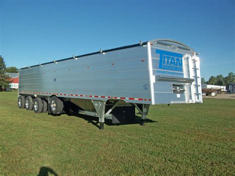 Titan trailers. Extra Blanket Bar. Water Tank. Full Width Boot Box - Oak with Titan Logo. 1/2 Boot Box - Oak with Titan Logo. Electrical Package - 30A Cord, Breaker Box and 1 Outlet. Additional Outlets. 13,500 B.T.U. Air Conditioner includes 30A Cord and Breaker Box. 15,000 B.T.U. Air Conditioner includes 30A Cord and Breaker Box. 