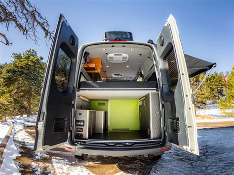 Titan vans. A complete van conversion that starts at $24,575. Components produced by Timber Van Kits and the installation is performed by Titan Vans. Includes off-grid electrical system, integrated fresh/gray water system, bed system, kitchen and much more. 