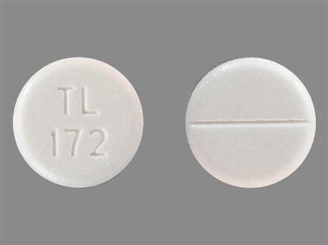 Pill Imprint T 175. This yellow round pill wit
