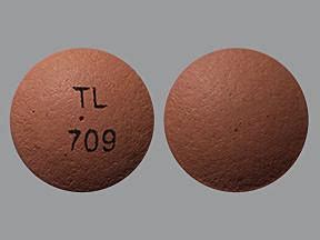 Tl 709 pill. Use WebMD’s Pill Identifier to find and identify any over-the-counter or prescription drug, pill, or medication by color, shape, or imprint and easily compare pictures of multiple drugs. 