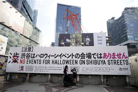 Tokyo’s Shibuya district raises alarm against unruly Halloween, even caging landmark statue