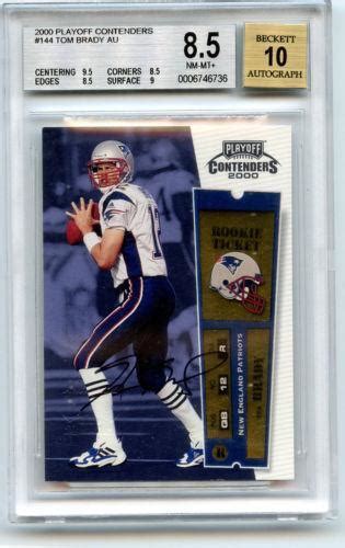 The lone PSA 10 Elite Status card sold for $6500 in 2011. #1 – The “Holy Grail” of Tom Brady RCs is the 2000 Playoff Contenders Championship Ticket Autograph /100. This is the parallel version of the Playoff Contenders Auto RC and is numbered to only 100. These cards are autographed and have a Refractor like …. 