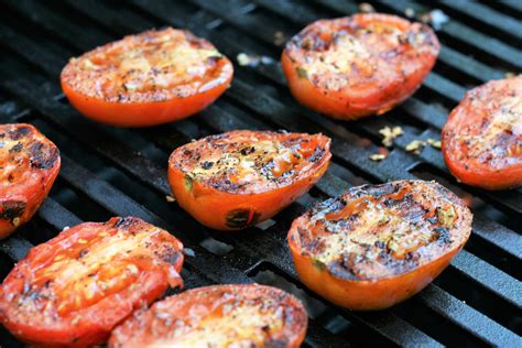 Tomato grill. Season the tomatoes with salt and pepper. Brush the cut side of the tomatoes with olive oil. Brush the grill grate or grill pan with olive oil. Place the tomatoes, cut side down, on the grill surface. Cover the grill and let cook for about 4 minutes. (Check after 2 minutes.) 