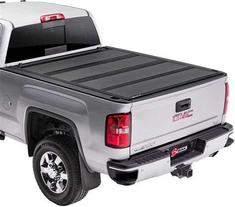 UV stable, prevents fading over time. Flush mounted panels for extremely low-profile design. Rubber seals between tonneau rails/truck bed rail for increased water resistance. Allows visibility of 3rd brake light when fully open. Automatic latching. No-drill, clamp-on installation. Rated up to 400lbs (evenly distributed weight). 