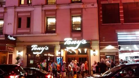 Tony's di napoli - midtown. Family style Italian meal in Times SquareFeaturing: Chicken Parmigiana Mozzarella en Carrozza (with ooey gooey cheese)Spaghetti & MeatballsFettuccine Alfredo... 