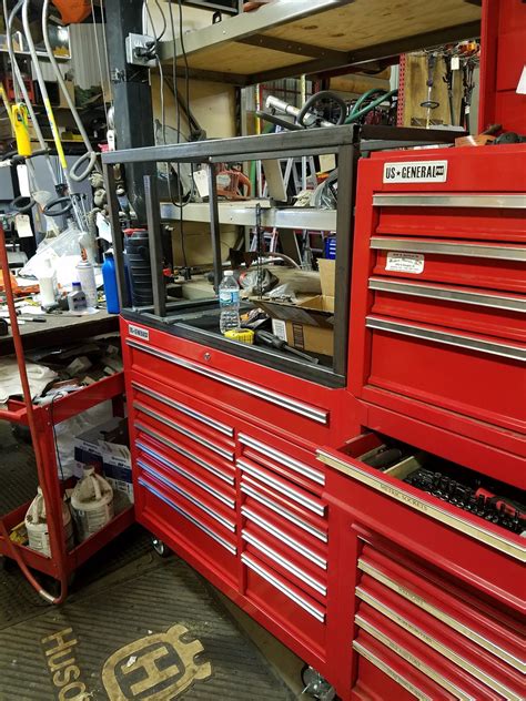 Toolbox hutch. Cheap toolbox built from a free filing cabinet! A filing cabinet is a great way to store larger tools in your garage. They are cheap, easy to find, and hold ... 