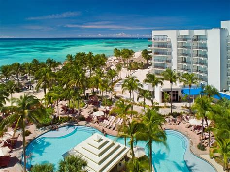 Top hotels in aruba. This Aruba beachfront resort features 320 contemporary guest rooms, including 55 suites with a private balcony overlooking the Caribbean Sea. Our Aruba resort also features two swimming pools, a collection of five dining options, a luxurious 13-treatment room spa, a state-of-the-art fitness center and a 24-hour casino. 