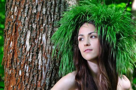 Topless girl in woods. .  ...