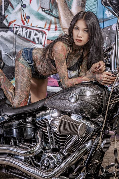 Topless tattood biker girls. .  <a href=https://art.trueskyhost.com/assets/ima...