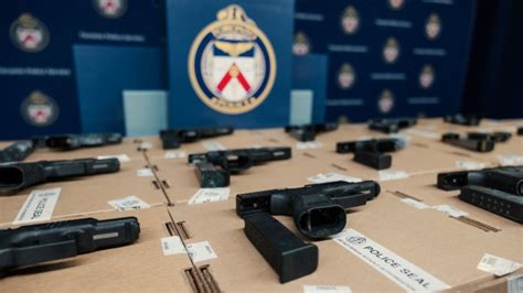 Toronto police seize 28 handguns from hotel room, man faces over 130 charges