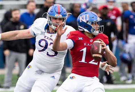 Daniels finished 14 of 23 and threw touchdown passes of 5, 60 and 8 yards and had touchdown runs of 12 and 9 yards. He found 11 different receivers and threw touchdown passes to Torry Locklin, Jared Casey and Luke Grimm. Kansas finished with 438 yards, including 280 rushing yards. The Jayhawks won back-to-back road games for the first time .... 