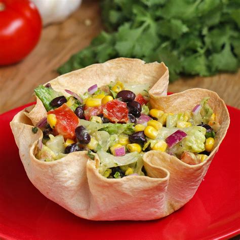 Tortilla bowl. Here's how. Step-by-step photos for making. Baked Tortilla Bowls & Cups. Skip the photo tutorial - Jump straight to the recipe. Use your choice of flour tortillas. I … 