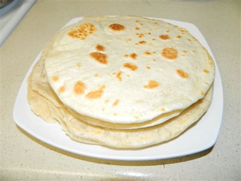 Tortilla de harina. Learn how to make homemade flour tortillas with simple ingredients and no tortilla press. These tortillas de harina are soft, pliable, and perfect for burritos, tacos, quesadillas, and more. 