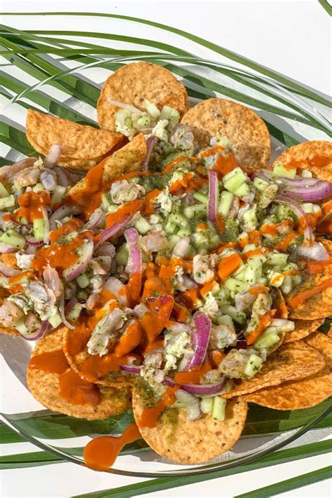 Tosticeviche - Order Tosticeviche online from Mango Crazy Modesto - 615 Kansas Ave.. ceviche served with salsa verde tostitos chips, topped with hot sauce, lime, tajin 