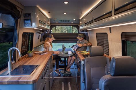 The Travato from Winnebago is one of the top-selling Camper Vans in North America. At 21’, it has a comfortable amount of space for two adults. It has 4 floorplans that give you plenty of options for sleeping and living areas. All floorplans have a convenient adjustable/removable table and mount to maximize the space..