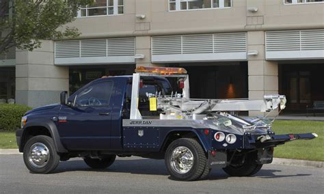 Tow truck wheel lift. 3 days ago · Wheel Lift. Similar to conventional tow trucks, the wheel lift — or full float truck — has a metal yoke that raises one of the car’s axels, lifting either the front or back tires off the ground. But hydraulics, instead of chains, suspend the truck or car to prevent damage. 3. 