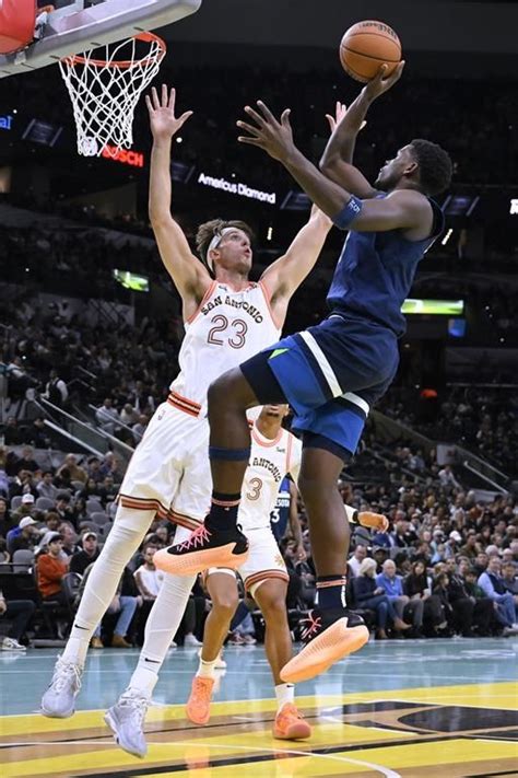 Towns, Timberwolves hold off Wembanyama, Spurs 117-110 in tournament opener for fifth straight win