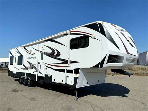 View the 2023 Venom 4114TK luxury fifth wheel toy hauler floorplan, specifications and quick tour video. Search. Dealer Locator Travel Trailers Fifth Wheels Toy Haulers ... 14'/15' opt. *This weight reflects the rolling average unit weight for each model. Your trailer weight will vary according to optional equipment.. 