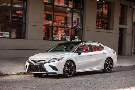 Toyota camry white. The “Check Engine” light in a Toyota Camry indicates that there’s a problem with the electronic engine control, electronic throttle control or electronic automatic transmission con... 