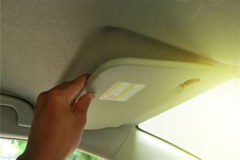 How To Fix A Sun Visor With A Broken Hinge. The first step is to remove the sun visor from the car. To do this, you will need to remove the screws that hold it in place. Once the screws are removed, you can carefully pull the sun visor out of the car. The next step is to take a look at the hinge that is broken.