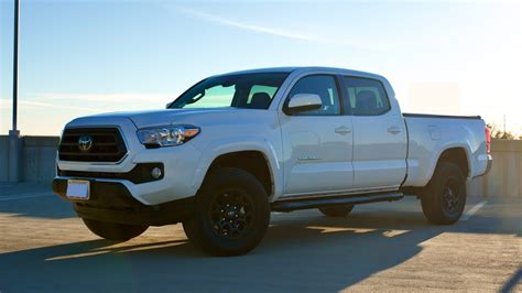Toyota tacoma long bed. The base model 2014 Toyota Tacoma has a curb weight of 3,765 pounds, states the company’s official website. Additional options, such as a larger engine or extended cab, increase th... 