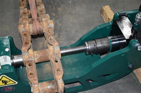 Track pin press. Aug 22, 2015. #3. Blow out the pin with the cutting torch, and beat it out. If you blow out enough of the pin, it will come out fairly easily. Careful to blow in straight, and not hit the link. Further you go, the better. Grind down the new pin with a flapper wheel. Get it to be a 0.001 to 0.002 interference fit. 