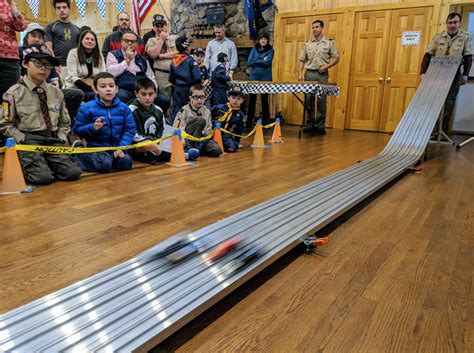 Track pinewood derby. Aluminum Tracks and Electronic Timers for Pinewood Derby Races. Our anodized aluminum track is available in lengths of 32', 40' or 48' long. Our track stores flat with no curved track section. Instead you add weight to the track stand causing it to flex into a long and natural curve just like you would with a wooden track. 